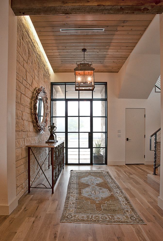 Cleaning Wood Floors with Vinegar for a Transitional Entry with a Cove Lighting and Cat Mountain Residence by Cornerstone Architects