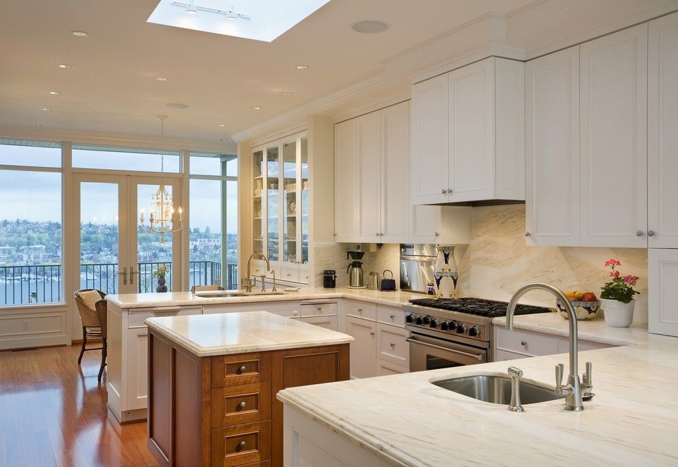 Coastal Kitchen Seattle for a Traditional Kitchen with a Wood Island and Newton Pl. by Hughes Studio Architects