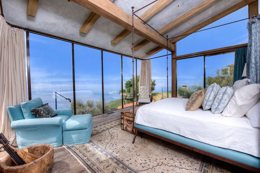 Coastline Realty for a Mediterranean Bedroom with a Wood Ceiling Beams and Big Sur Coast Ridge Estate by Decker Bullock Sotheby's International Realty