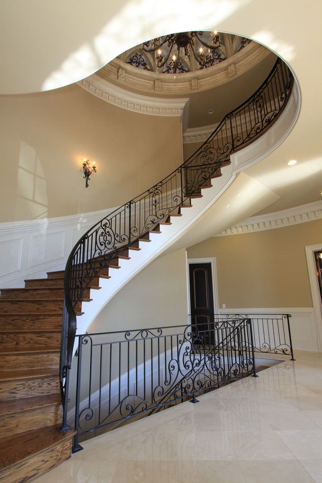 Cobb County Tractor for a Traditional Entry with a Round Stairs and Luxury Interiors by Alex Custom Homes, Llc