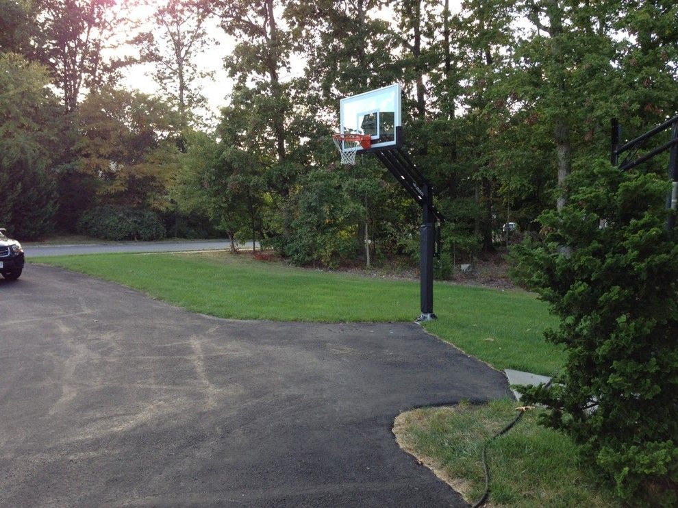 College Basketball Court Dimensions for a Traditional Landscape with a in Ground Basketball System and Paul G's Pro Dunk Gold Basketball System on a 20x30 in Lorton, Va by Pro Dunk Hoops