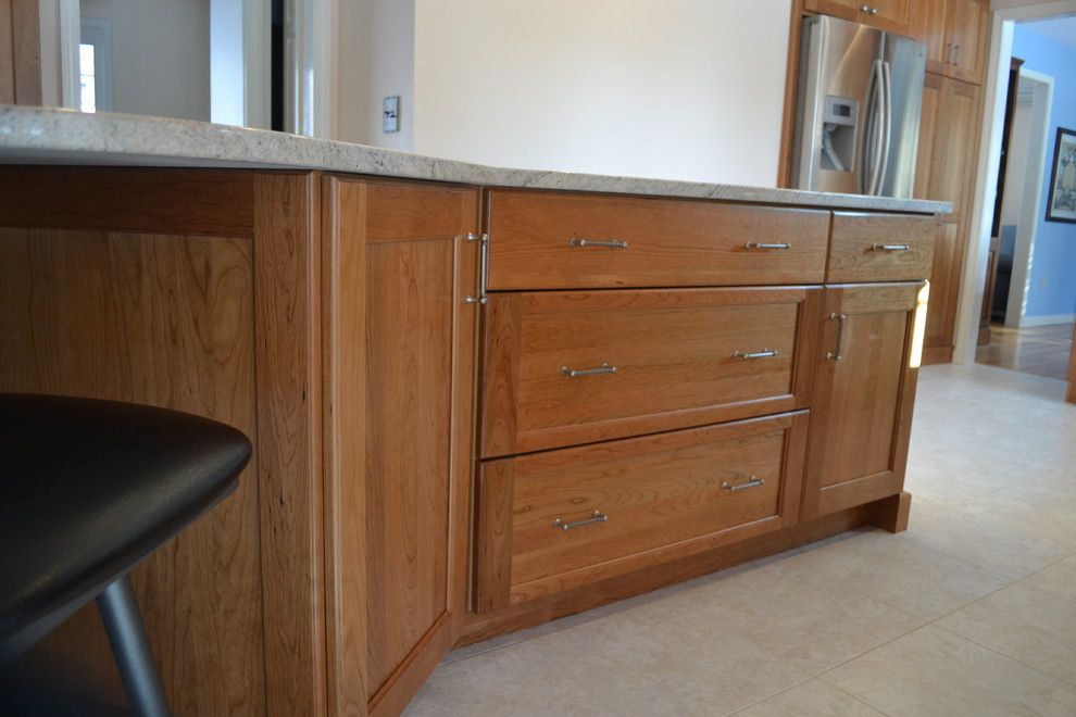 Congoleum for a Traditional Kitchen with a Island Seating and Farmhouse Road Kitchen, Bedford by Granite State Cabinetry