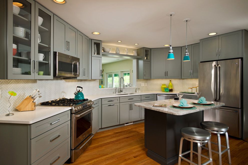 Conservatory at Druid Hills for a Eclectic Kitchen with a Floating Shelf and Angled Gray Kitchen by Kitchen and Bath World, Inc