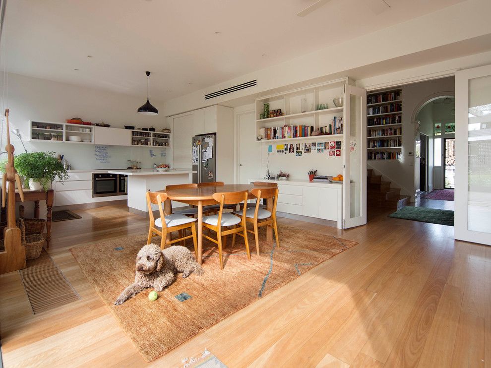 Consignment Furniture Reno for a Contemporary Dining Room with a Built in Shelves and Northcote Residence by Rebecca Naughtin Architect