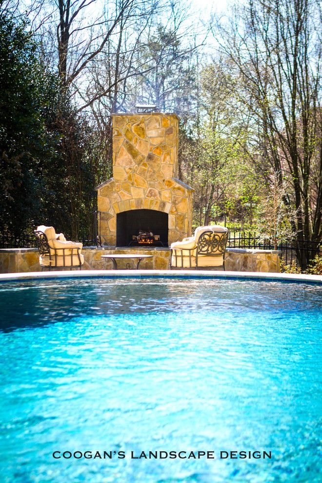 Coogans for a  Patio with a Holly Bushes and Outdoor Fireplaces by Coogan's Landscape Design