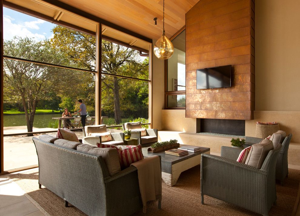 Copper Chimney for a Contemporary Porch with a Glass Walls and Cove House by Furman + Keil Architects