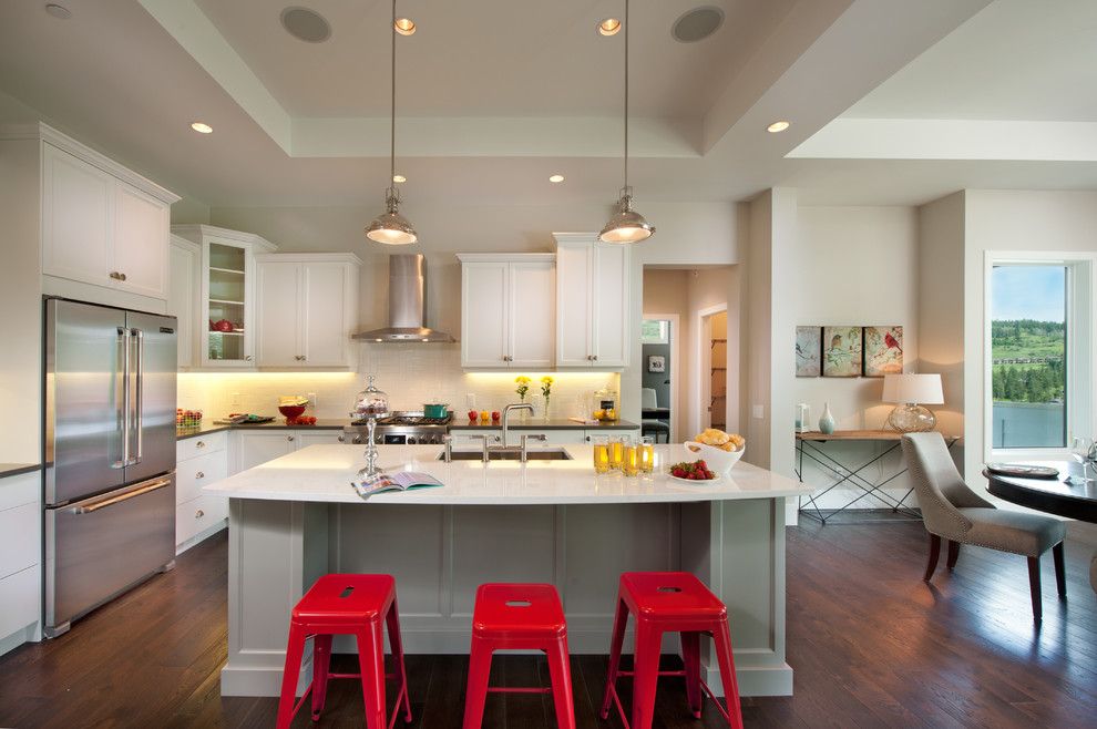 Copper Creek Theater for a Contemporary Kitchen with a Undermount Sink and the Cooper Show Home by Sticks and Stones Design Group Inc.