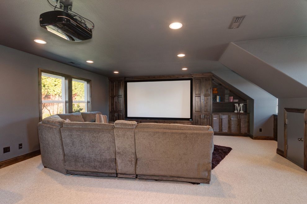 Copper Creek Theater for a Rustic Home Theater with a Storage and Organization and Theater Room by Sitka Projects