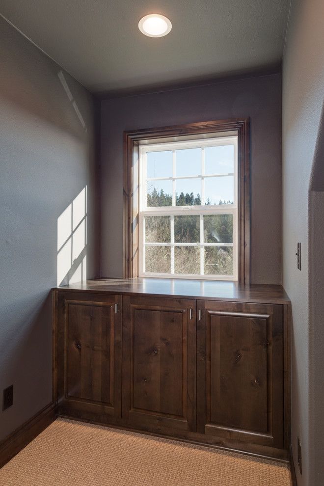 Copper Creek Theater for a Rustic Home Theater with a Wet Bar and Theater Room by Sitka Projects