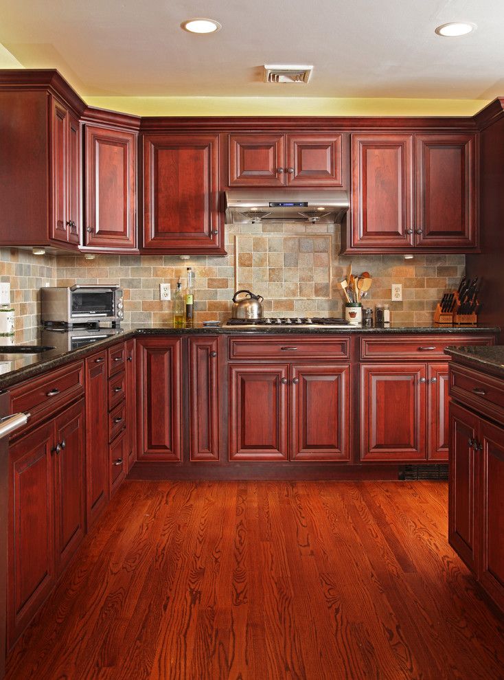 Cordovan Color for a Traditional Kitchen with a Farmhouse and Cordovan Cherry and Deep Blue Granite Makeover by Kitchen Magic