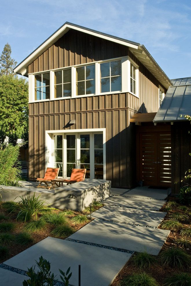 Cornus Sericea for a Transitional Exterior with a Metal Roof and Custom Agrarian Style Residence by Arcanum Architecture