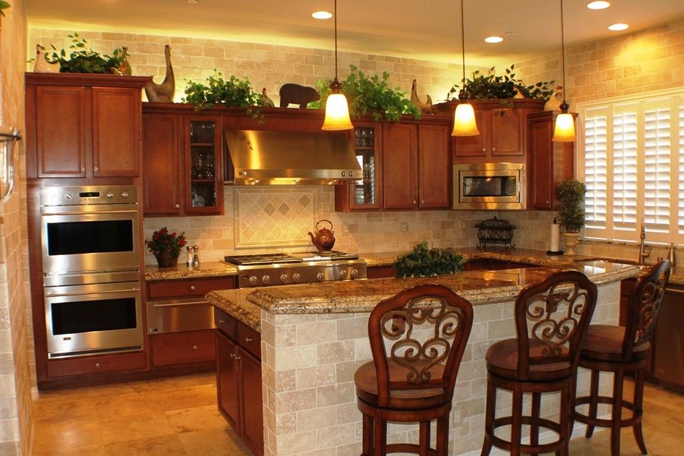 Craigslist Las Vegas Appliances for a Mediterranean Kitchen with a Brown Cabinets and Amber Field by Las Vegas Remodel & Construction