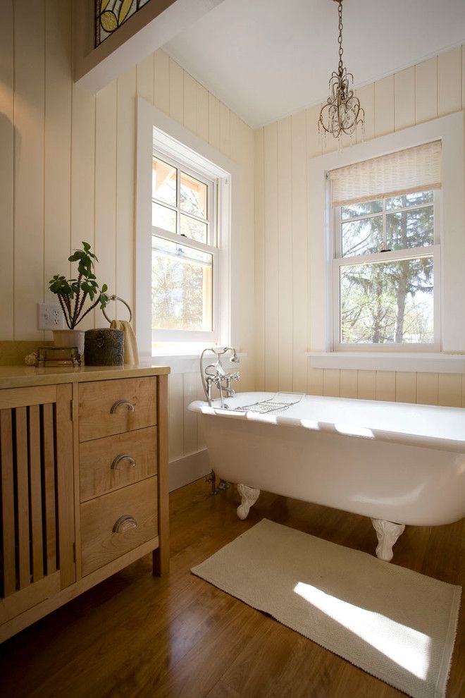 Craigslist Pittsburgh Furniture for a Farmhouse Bathroom with a Vintage Tub and Custom Homes by Phinney Design Group