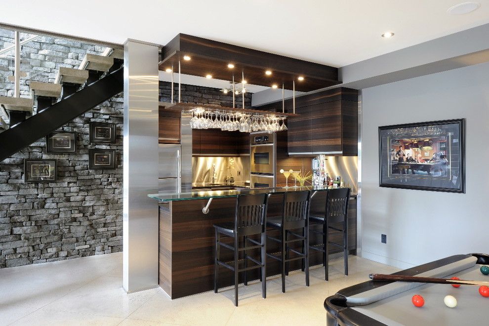 Crawford Electric Supply for a Contemporary Basement with a Oak Cabinets and Lake Front Basement Bar by Luxurious Living Studio Inc.