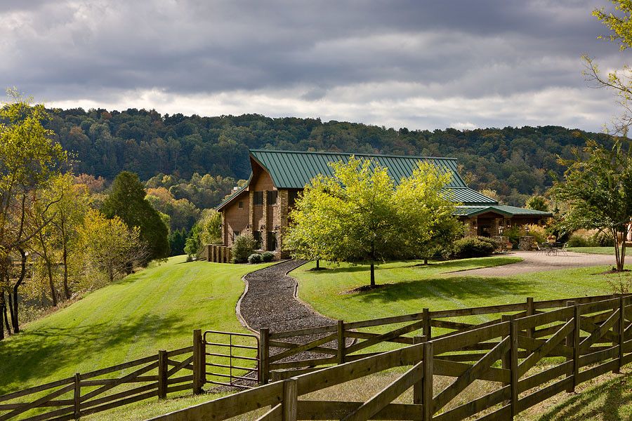 Crazy Horse Nashville for a Rustic Exterior with a Hand Hewn and Repurposed Barn by Appalachian Log and Timber Homes