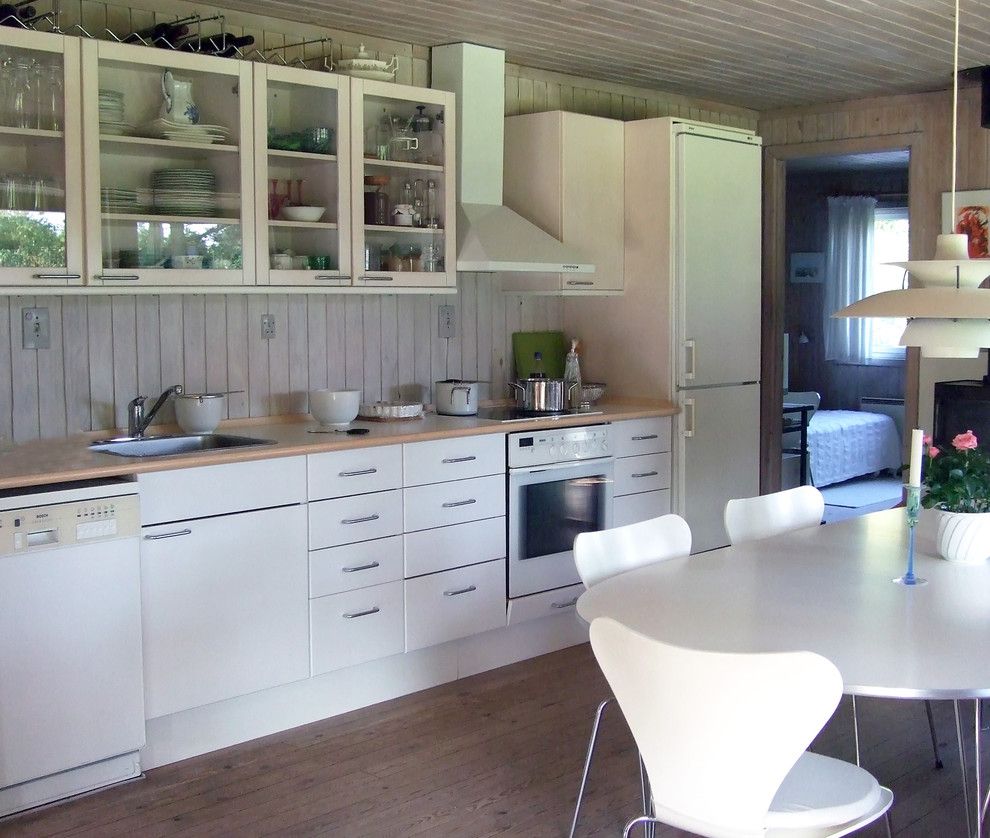 Cudd Energy Services for a Rustic Kitchen with a Kitchen Chairs and Small Kitchen by Susan Serra