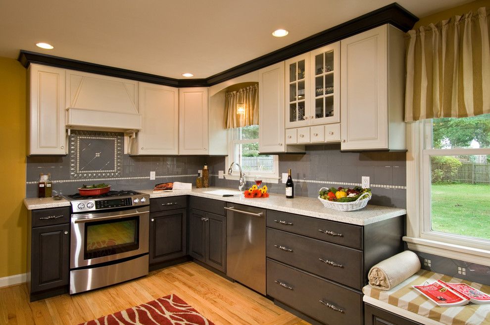 Cuddle Down for a Traditional Kitchen with a White Upper Cabinets and Multi Colored Kitchen by Kitchen and Bath World, Inc