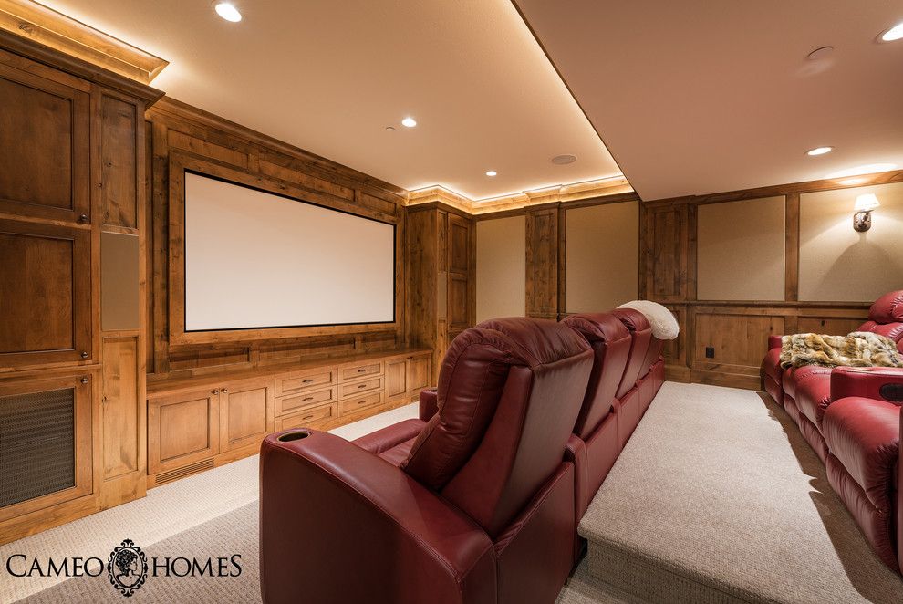 Culver City Theater for a Rustic Home Theater with a Wood Paneling and Luxury Home in Tuhaye, Utah by Park City Home Builder, Cameo Homes Inc. by Cameo Homes Inc.