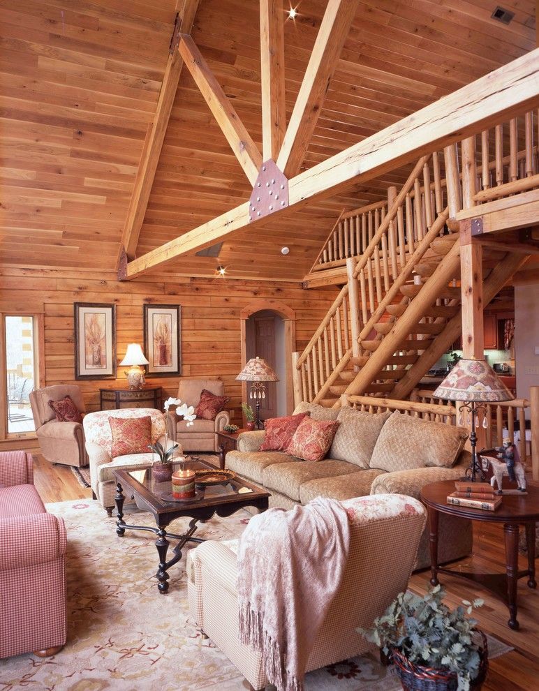 Cumberland Furniture for a Traditional Living Room with a Dark Wood Coffee Table and Cumberland Mountain by Gastineau Log Homes, Inc.