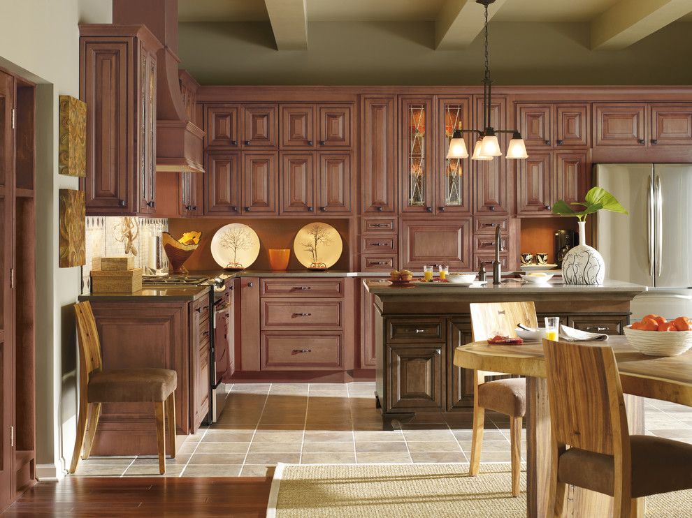 Custom Craftworks for a Traditional Kitchen with a Overhead Lighting and Kitchen Cabinets by Capitol District Supply