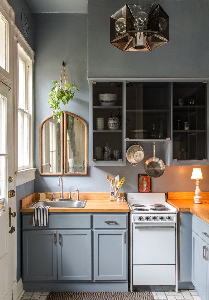 Darkside Window Tinting for a Traditional Kitchen with a Blue Kitchen and Ursulines Apartment by Logan Killen Interiors