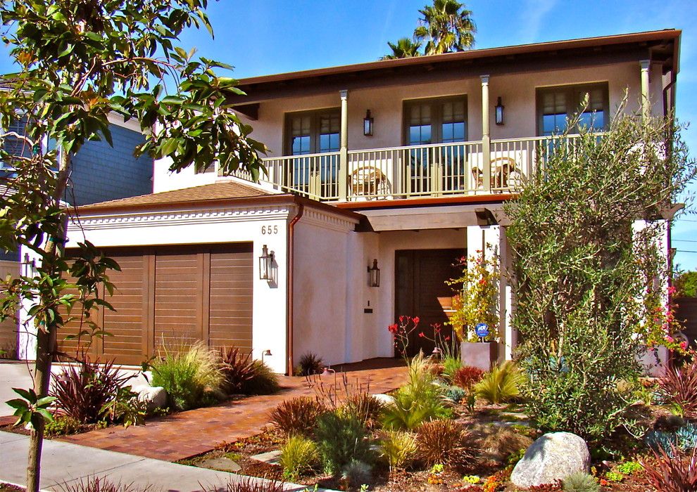 Dayton Door Sales for a Beach Style Exterior with a Garage Door and Wendy Resin Interiors by Bungalow Design