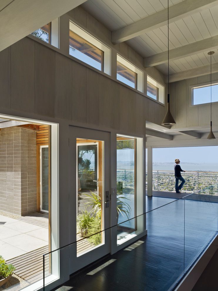 Dayton Door Sales for a Midcentury Entry with a Pendant Light and Berkeley Hills House by Yamamar Design