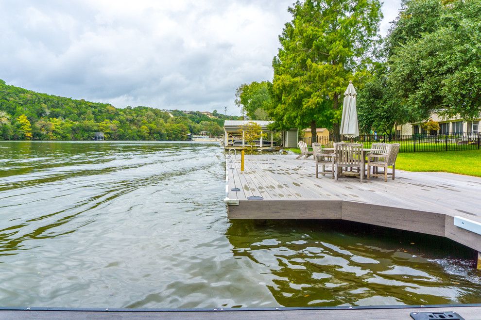 Decks and Docks for a Contemporary Deck with a Gray Boat Slip and Phillips Ranch Dock (Timbertech) by Timbertown