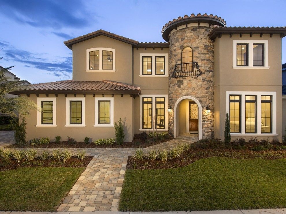 Del Webb Orlando for a Mediterranean Exterior with a Cupolas Roof Turrets and Beautiful Tuscan Villa  in Windermere Florida's, Casa Del Lago by Element Home Builders