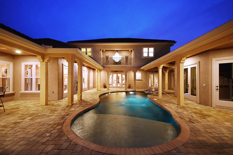 Del Webb Orlando for a Mediterranean Patio with a Turret Design and Casa Del Aqua by B&a Design Studio, Inc.