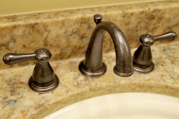 Delta Faucet Warranty for a Traditional Bathroom with a Double Vanity and Tranquil Retreat by Case Design/remodeling Birmingham