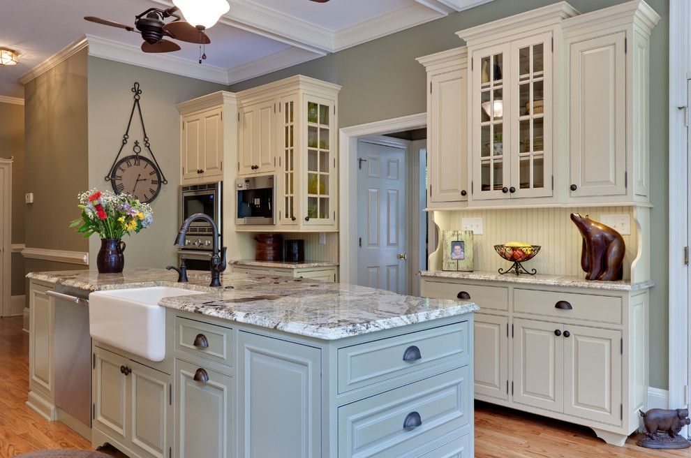 Delta Faucet Warranty for a Traditional Kitchen with a Glass Front Cabinets and Teri Turan by Turan Designs, Inc.