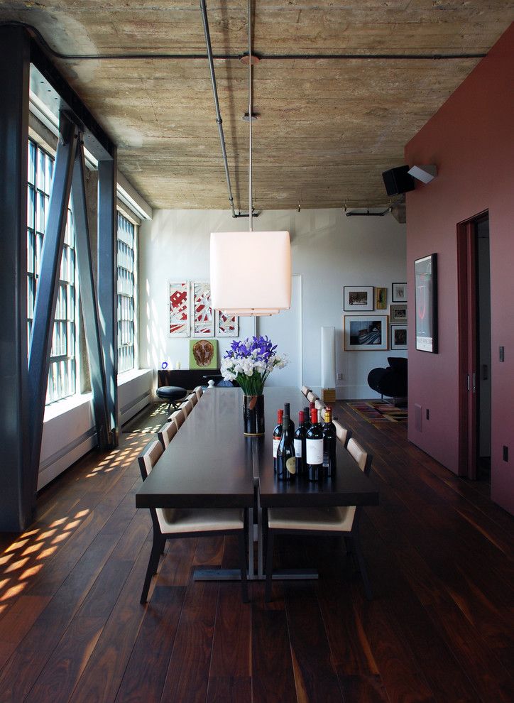 Demising Wall for a Modern Dining Room with a Wood Ceiling and South Park Loft by Ccs Architecture