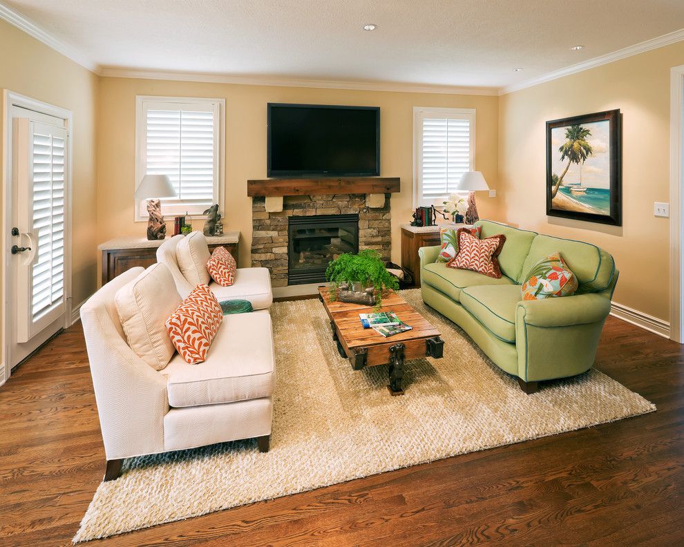 Deseret Digital Media for a Contemporary Living Room with a Green Sofa and Living Room by Becky Berg Design