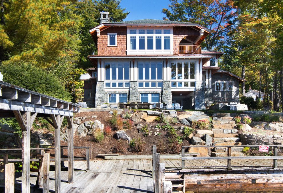 Dimensional Shingles for a Rustic Exterior with a Cedar Siding and Great Camp by Phinney Design Group