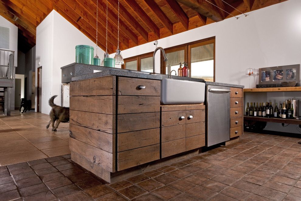 Distressing Furniture for a Industrial Kitchen with a Built in Storage and Esca by Leo Claudio Cabinets