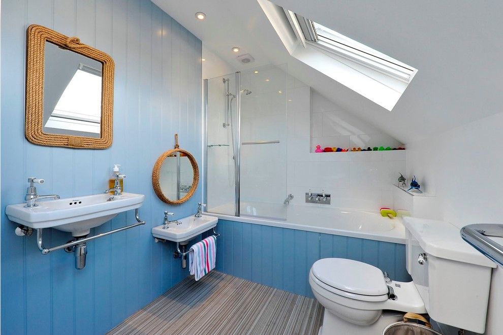 Diy Sunburst Mirror for a Beach Style Bathroom with a Blue Bathroom and Wandsworth. London by Pva Developments