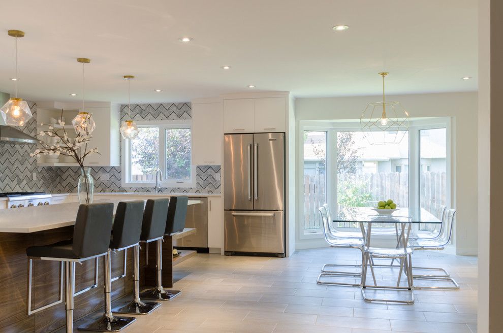 Dlux for a Contemporary Kitchen with a Barstools and Lindenwoods by Dlux Design & Co.