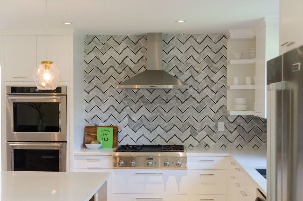 Dlux for a Contemporary Kitchen with a Tile Backsplash and Lindenwoods by Dlux Design & Co.