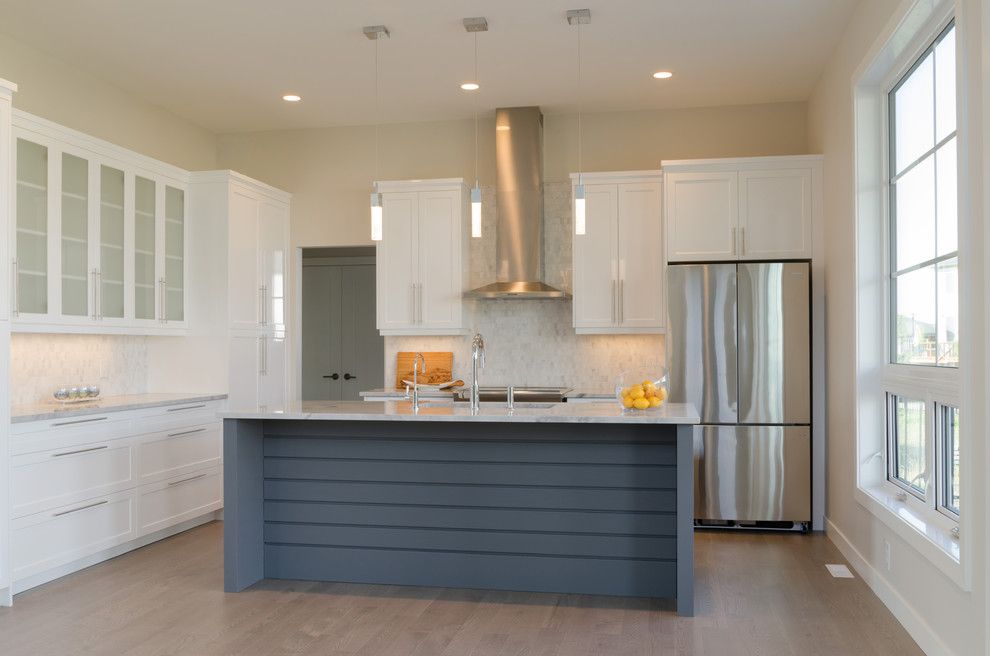 Dlux for a Transitional Kitchen with a Painted Island and Clear Spring by Dlux Design & Co.