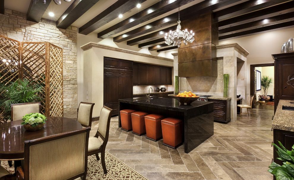 Door Jams for a Mediterranean Kitchen with a Copper Hood and Spanish Oaks Hacienda by Jauregui Architecture Interiors Construction