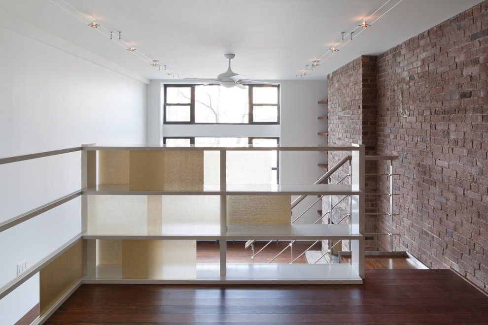 Dr Energy Saver for a Modern Staircase with a Built in Shelves and Greenwich Loft Studio by the Turett Collaborative