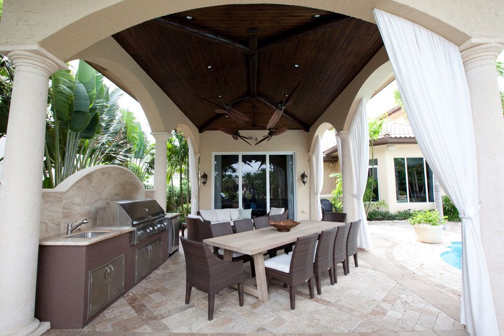 Drakes Landing for a Tropical Patio with a Covered Patio and Hawks Landing by Complete Home Improvement Group Inc.