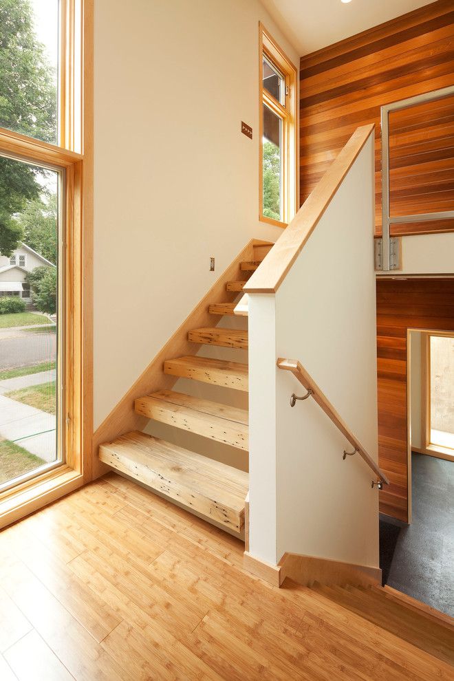 Drywall Textures for a Modern Staircase with a Wood Trim and Urban Green by Sala Architects