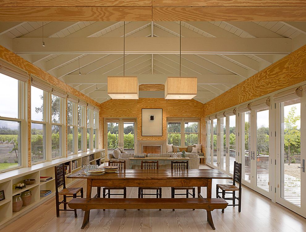 Eagle Roofing for a Farmhouse Dining Room with a Rustic Table and West Dry Creek Residence by Nick Noyes Architecture