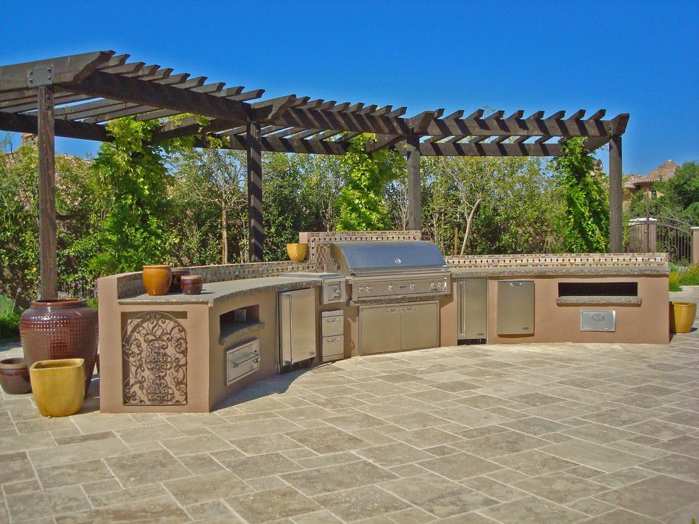 Eagle Roofing for a Mediterranean Patio with a Arbor and Mediterranean Patio by Houzz.com