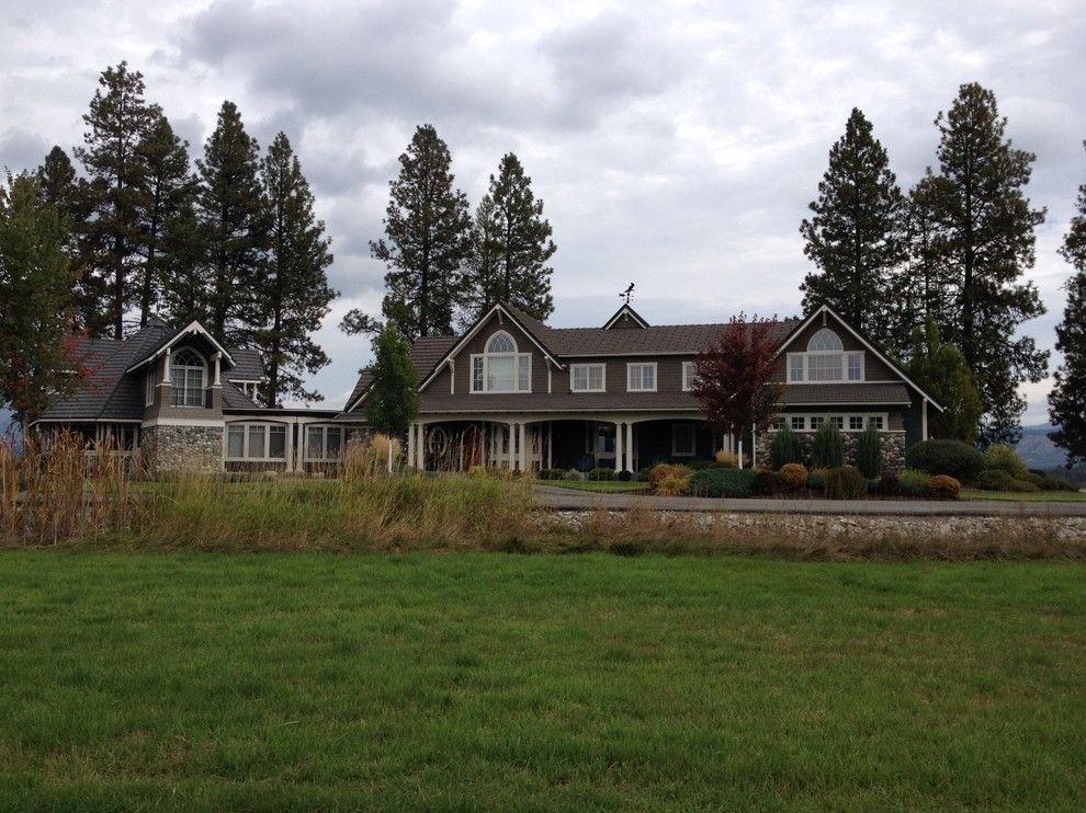 Eagle Roofing for a Transitional Exterior with a Grass Lawn and Master Suite Addition by Eaglepointe Construction & Management