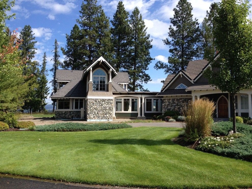 Eagle Roofing for a Transitional Exterior with a Grey Siding and Master Suite Addition by Eaglepointe Construction & Management