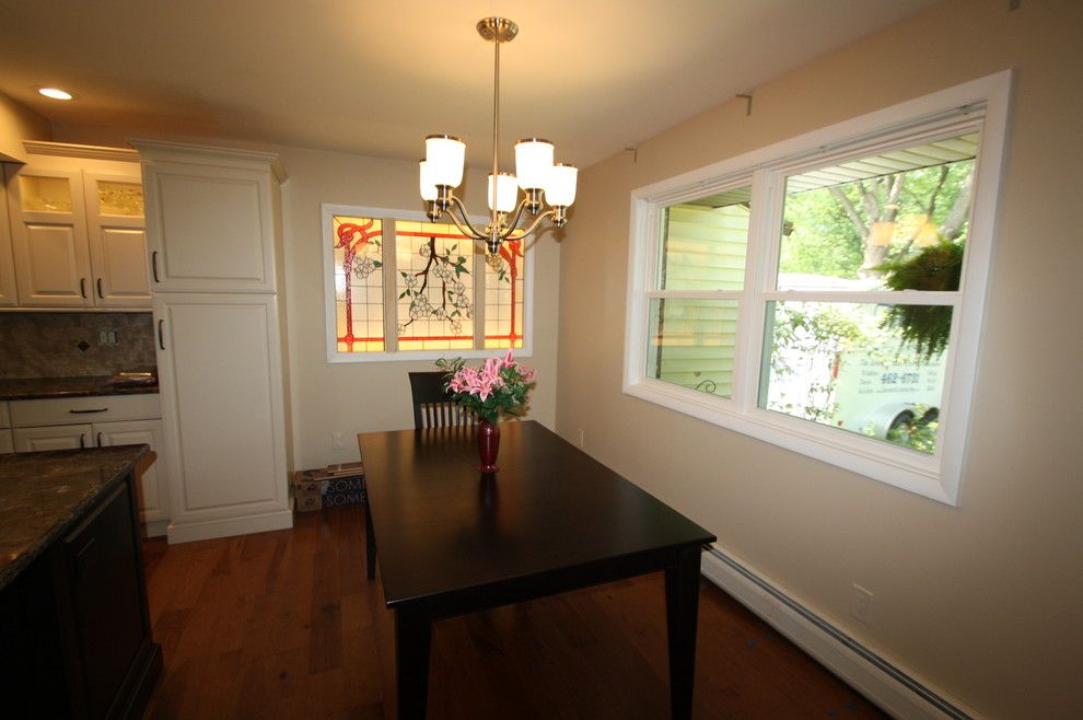 Earth Sheltered Homes for a Traditional Kitchen with a Kitchen Remodel and New Energy Star Windows by Bennett Contracting, Inc.