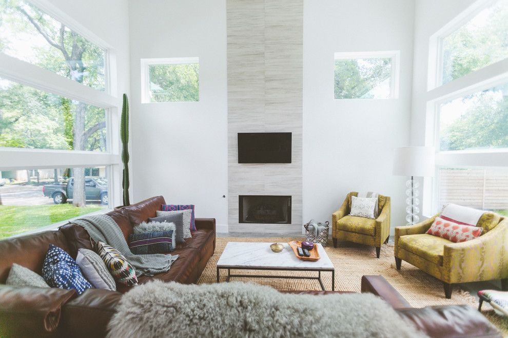 Eclipse Window Tinting for a Contemporary Living Room with a Yellow Armchairs and My Houzz: Bright and Boho Austin Home Inspired by a Local Hot El by Heather Banks